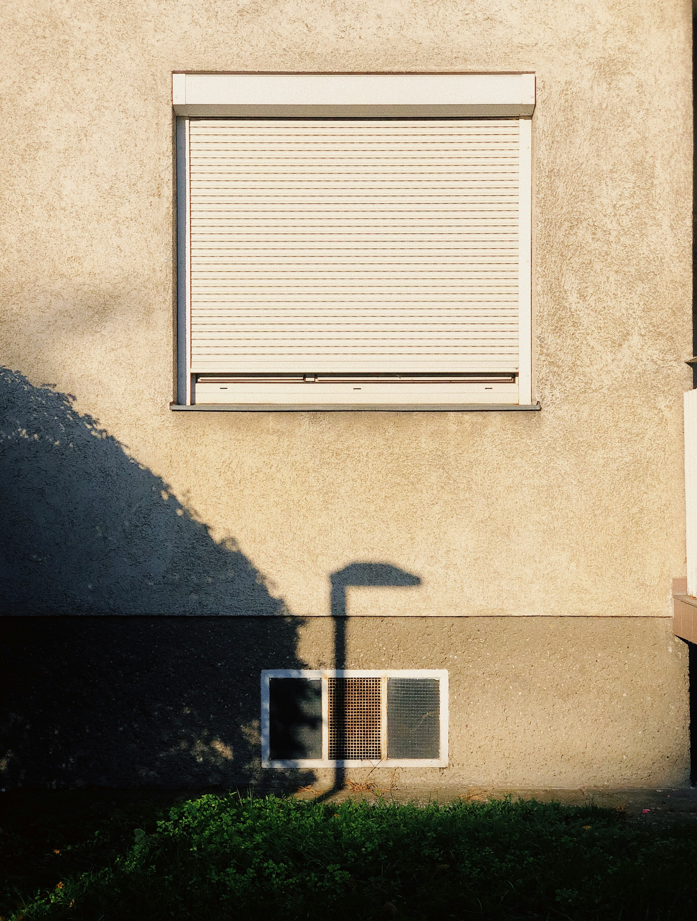 white window blinds on window